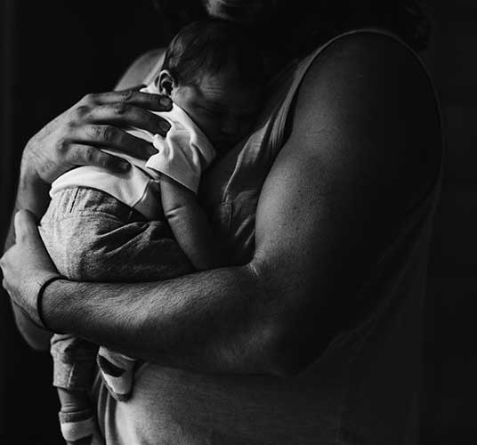 Mom holding baby